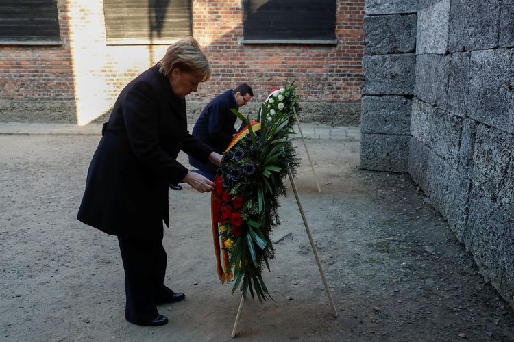 Merkel pays first visit as chancellor to Auschwitz  camp