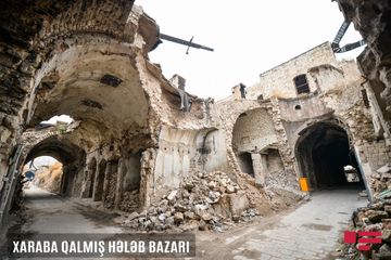 Müharibənin xarabalığa çevirdiyi Hələb: Nəsiminin məzarından REPORTAJ