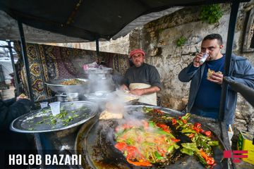 Müharibənin xarabalığa çevirdiyi Hələb: Nəsiminin məzarından REPORTAJ