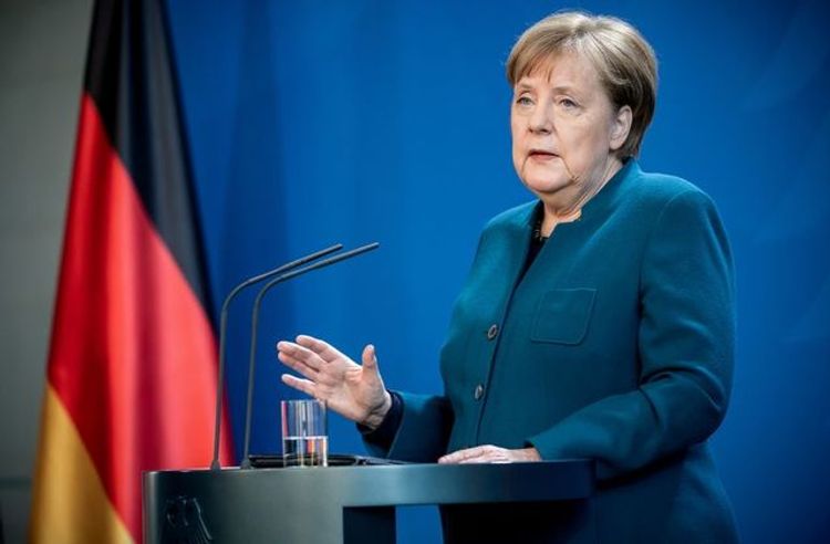 Merkel ends her self-quarantine, returns to chancellery