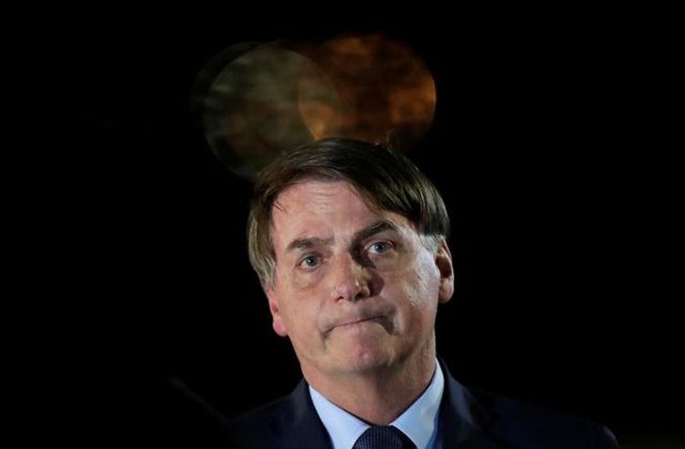 Bolsonaro says Brazil cannot take months of isolation