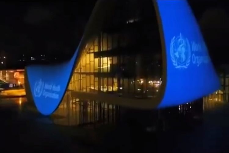 WHO flag videoprojected on building of Heydar Aliyev Center