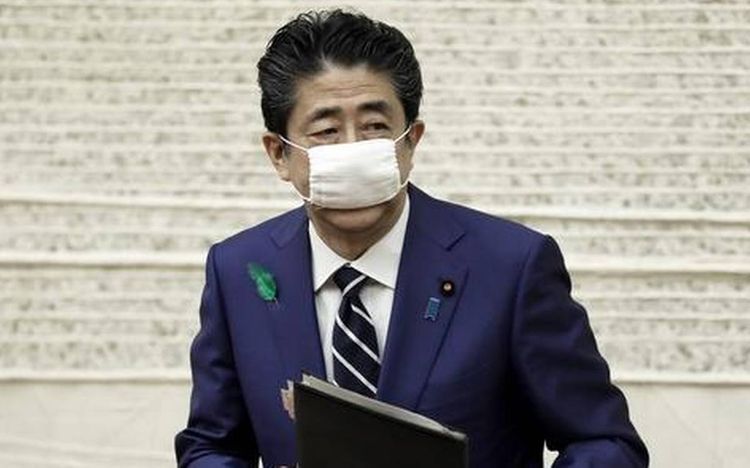 Japan offers $930 virus stimulus payment to all residents