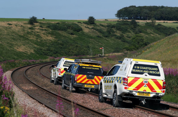 Three people die in Scottish train derailment, carriages piled up