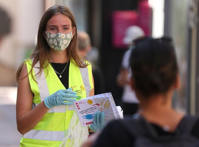 Dutch make masks mandatory as new coronavirus cases taper