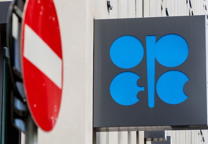 Oil turns lower after OPEC cuts 2021 global demand outlook