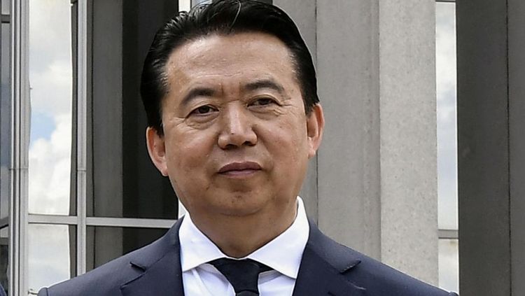 Former Interpol chief Meng Hongwei handed 13.5 year jail sentence