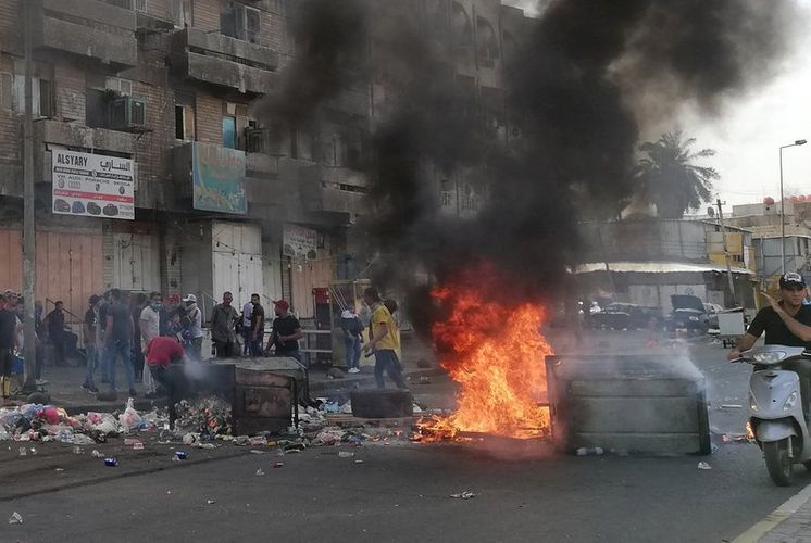 Clashes in Baghdad wound 7, authorities remove barriers and open roads