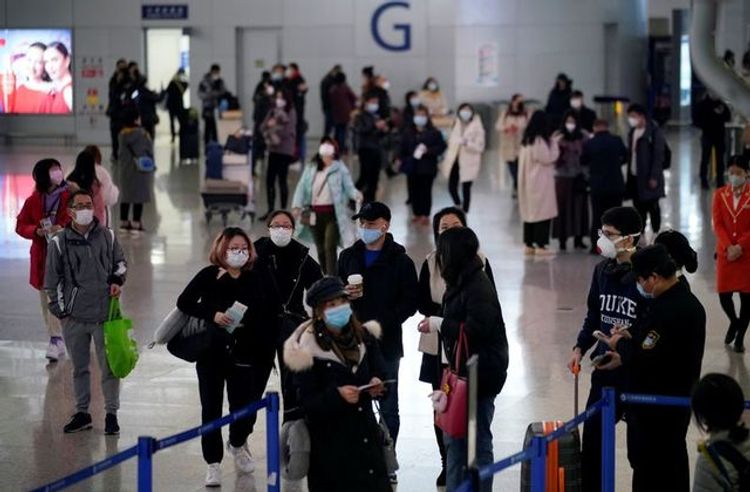 China says it is confident of minimizing virus transmission risks on planes