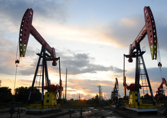 Oil prices slip as COVID-19 case surge dents fuel demand hopes