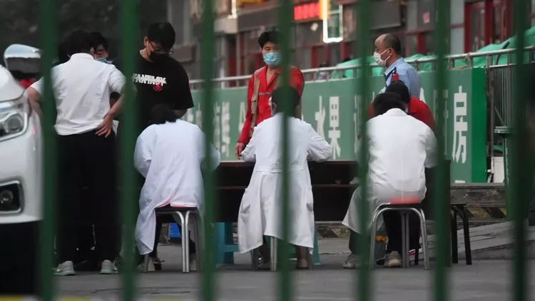 Beijing authorities shut down food market after cluster of coronavirus cases detected