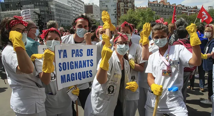 French healthcare workers march in unsanctioned protest in Paris