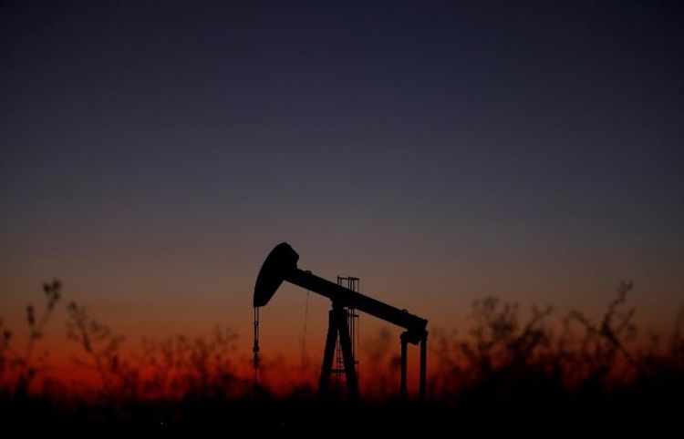 Oil up above 1% on tighter supply, but virus fears cap gains