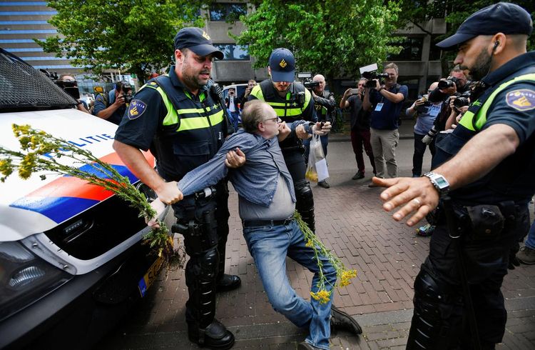 Dozens detained at anti-social distancing rally in The Hague