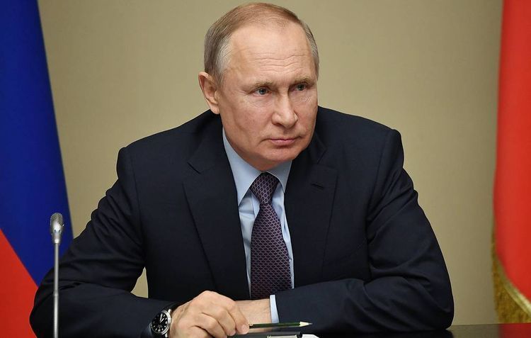 Putin signs constitutional amendments into law