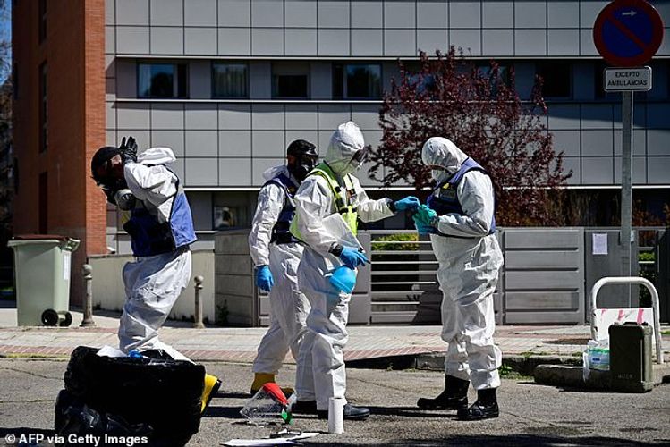 Spain tightens coronavirus lockdown by ordering all non-essential workers to stay indoors as death toll soared by 832 to 5,690 