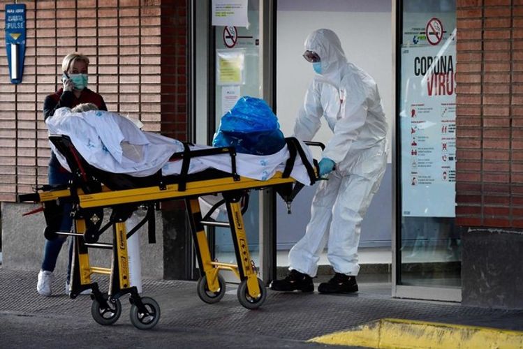 Spain reports 812 virus deaths in 24 hours