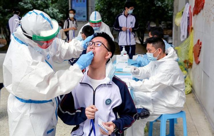  China reports 12 new coronavirus cases versus four a day earlier