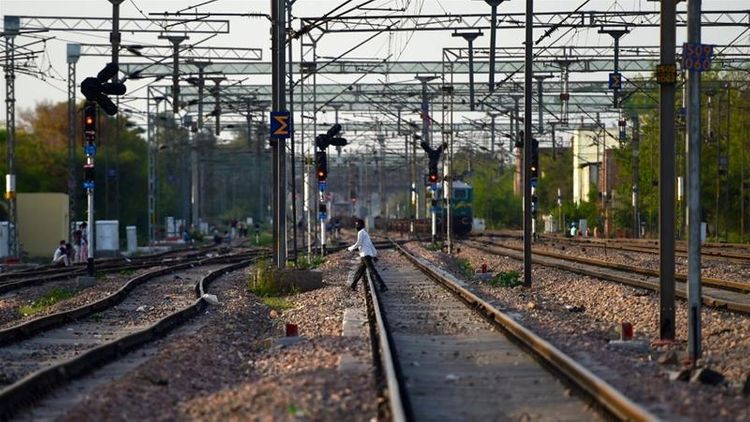 Train kills 14 migrant workers walking home in India