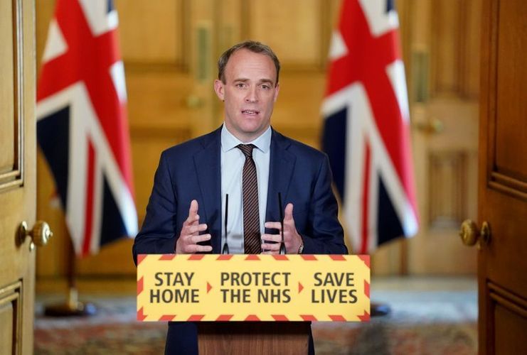 UK economy not to be back to work until July at very earliest, Raab says