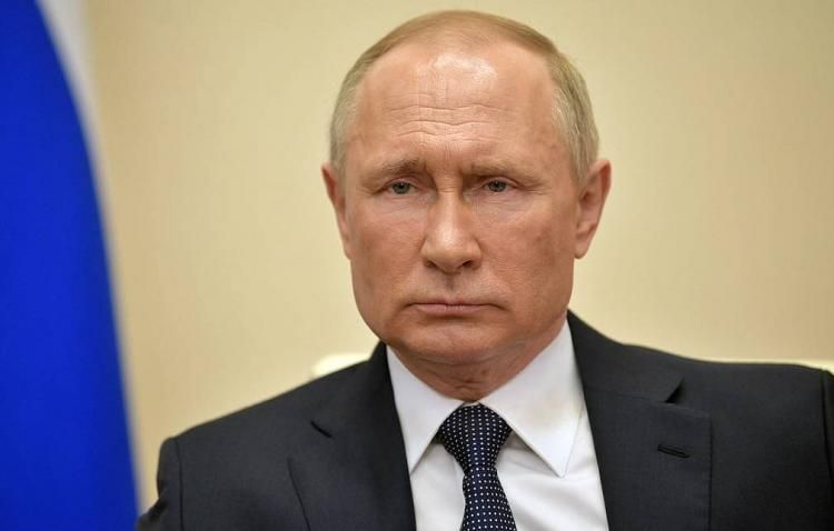 Putin signs decree to ease Russia
