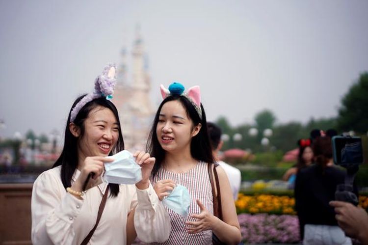 Paris salons, Shanghai Disney reopen despite global alarm over second coronavirus wave