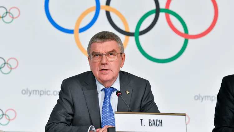 Japanese PM, IOC president confident Olympics will be held on time despite pandemic