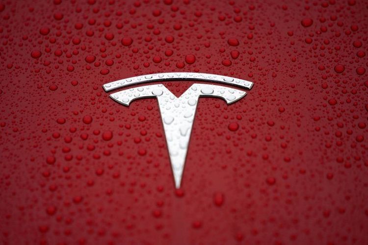 Tesla plans to produce electric car chargers in China, document shows
