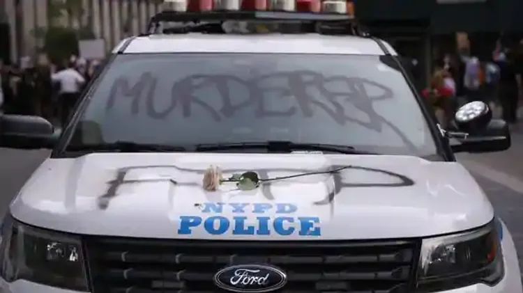 Police vehicles vandalized after man who was shot by police dies near Minneapolis