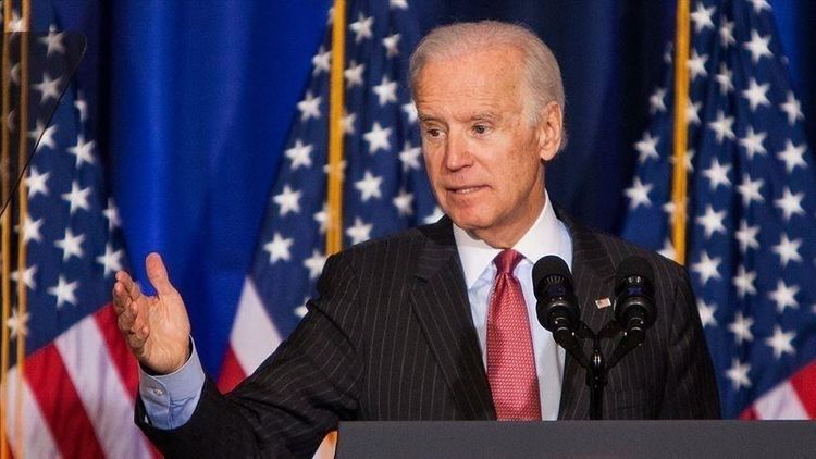 Biden says gun violence is stain on US, urges action