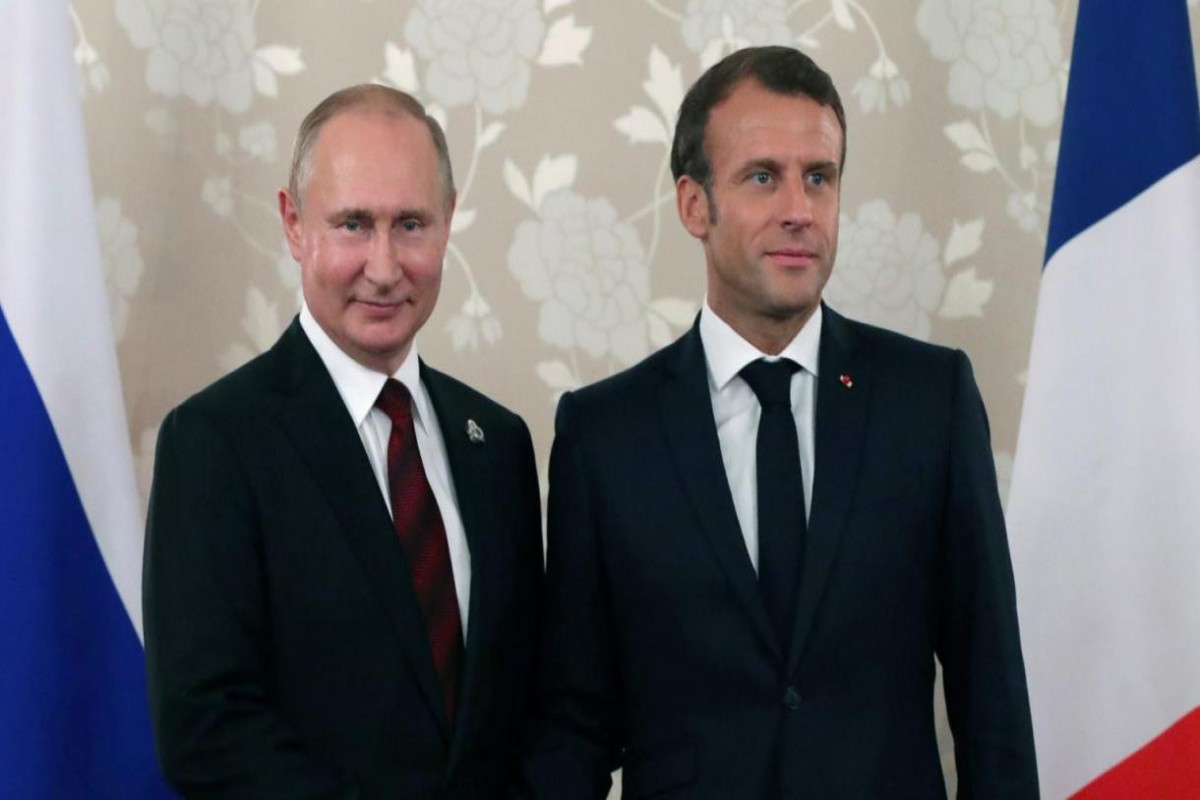 Президенты России и Франции Владимир Путин и Эммануэль Макрон