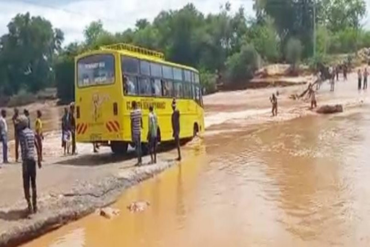 At least 20 killed as bus swept away by flood waters in Kenya