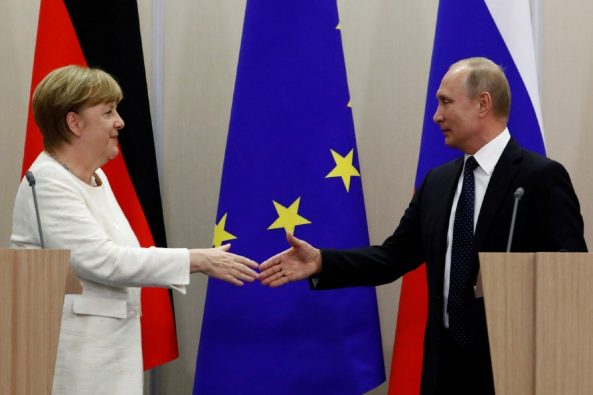Former German Chancellor Merkel, Russian President Vladimir Putin