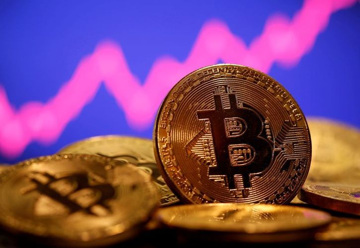 Bitcoin pulls back from brink of $50,000