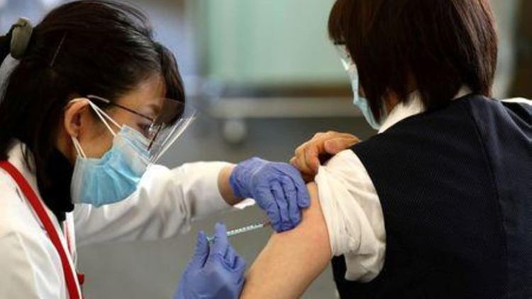 Japan begins COVID-19 vaccination in 