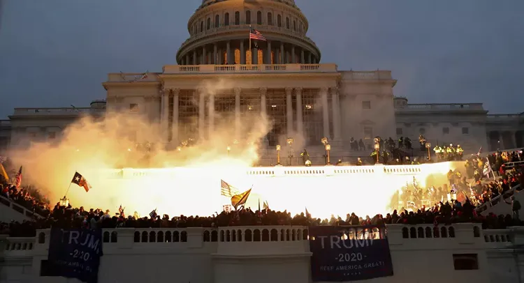 Four dead, 52 arrested after day of violence and chaos at US Capitol