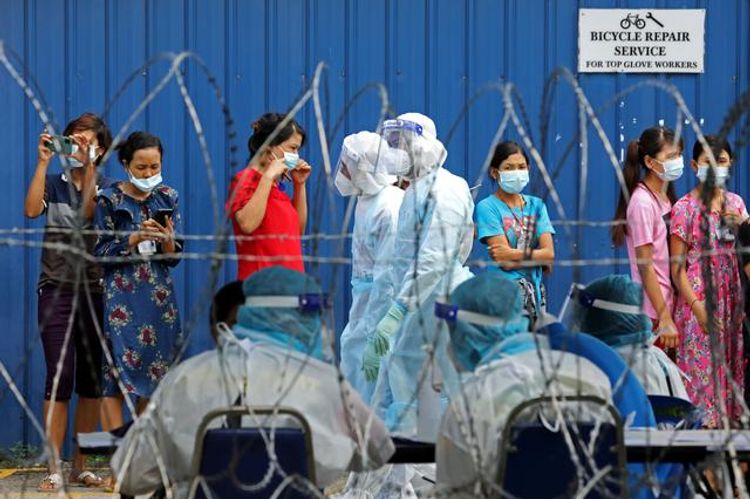 Malaysia to reimpose 2-week limited lockdown to stem virus spread