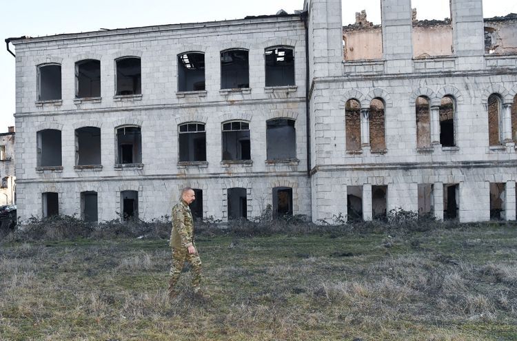 Azerbaijani President inspects the destroyed building of the Shusha Realni School - victim of Armenian vandalism