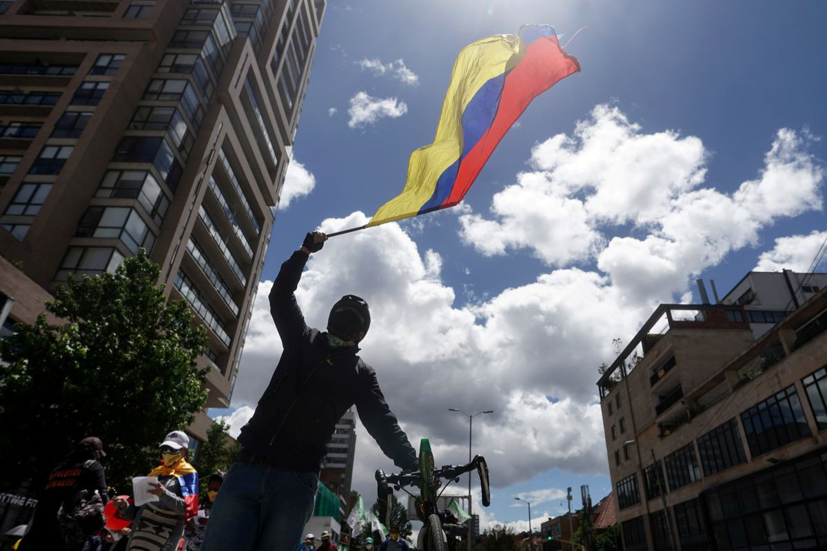 In Colombia, protesters march on as talks stall and blockades remain