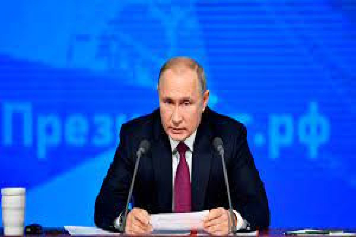 Russian economy has adapted to sanctions, Putin says