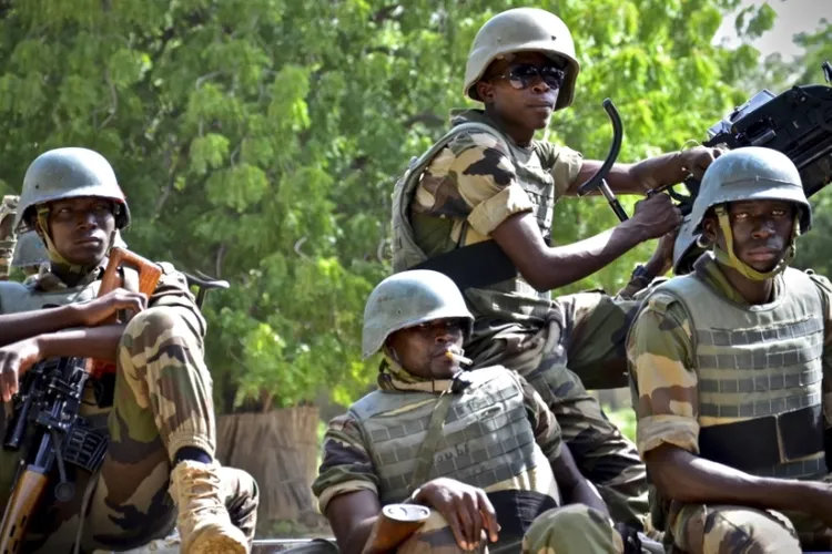 Armed men attack passenger convoy and village in Niger, killing 58