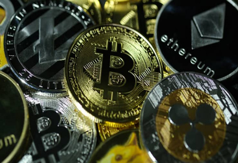 Bitcoin rebounds after a wild weekend that took it below $32,000