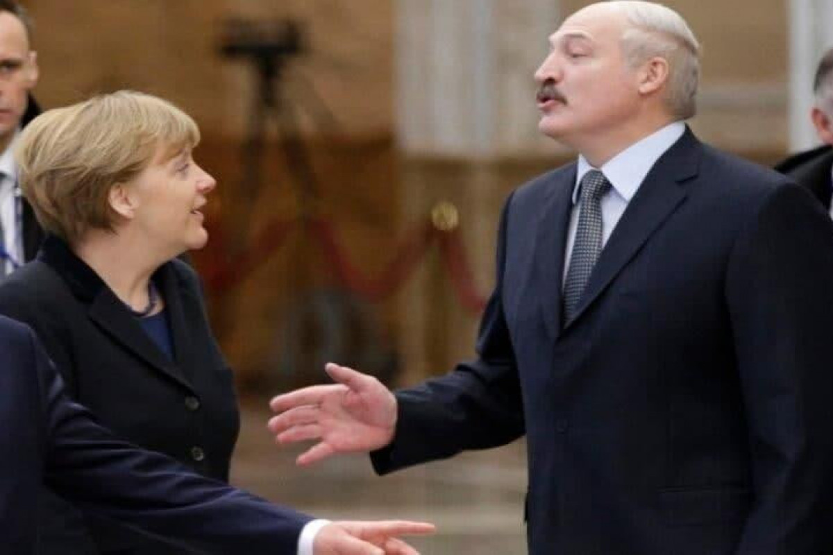 Президент Белоруссии Александр Лукашенко и и.о. канцлера ФРГ Ангела Меркель