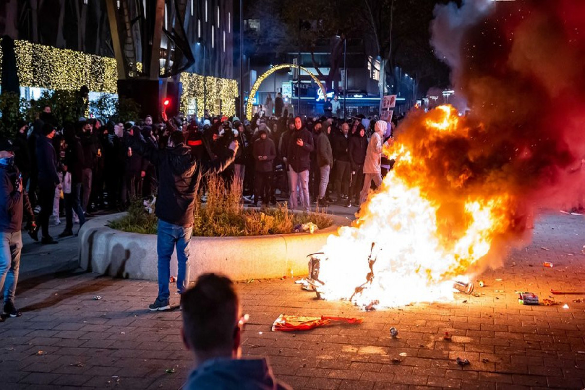 Two people injured after Covid protest turns violent in the Netherlands