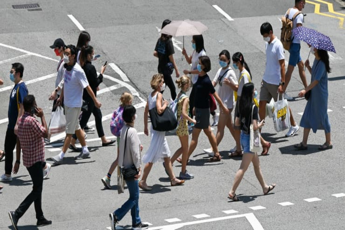 Singapore to open ‘vaccinated travel lanes’ with 8 more countries as it aims for ‘new normal’
