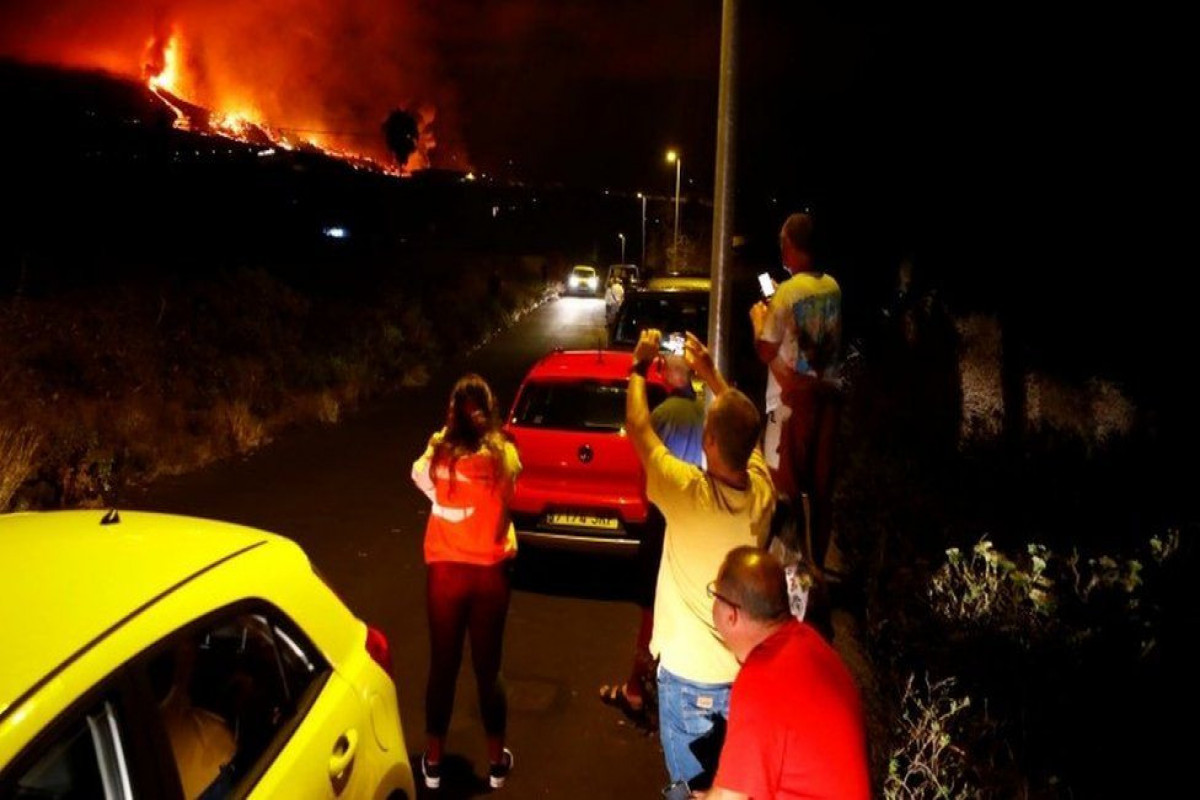 Lava from erupting volcano destroys homes in Canary Islands