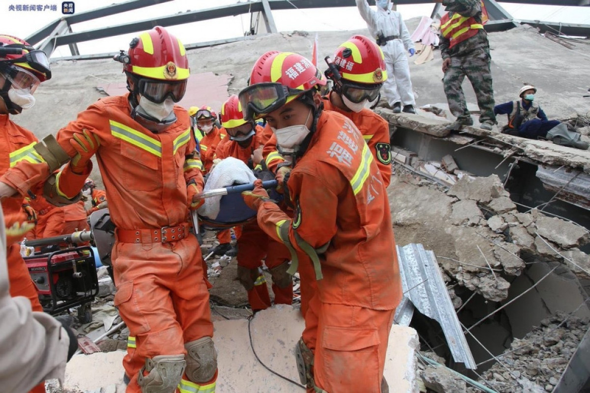 Five rescued after building collapses in central China