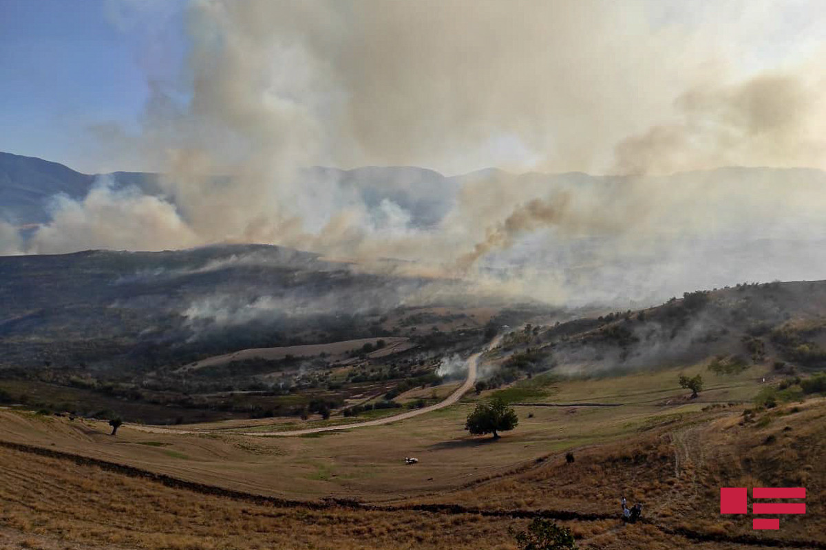 Fire erupting in grain field in Azerbaijan