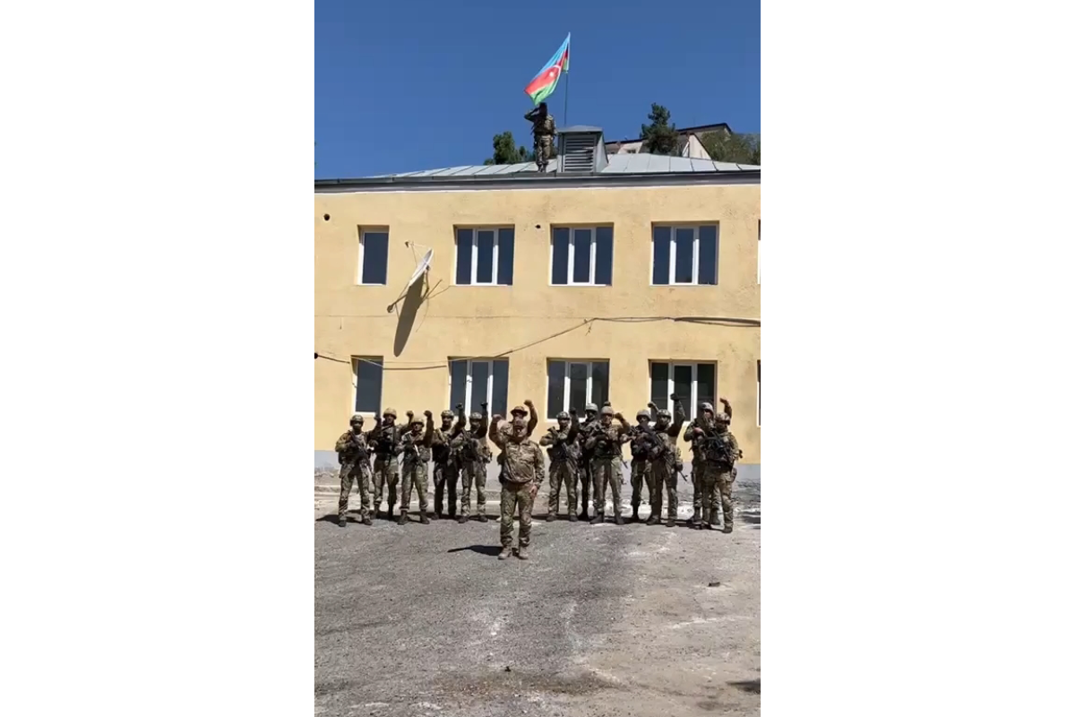 Azerbaijani flag raised in center of Lachin city, and reported to President, Commander-in-Chief Ilham Aliyev-VIDEO 