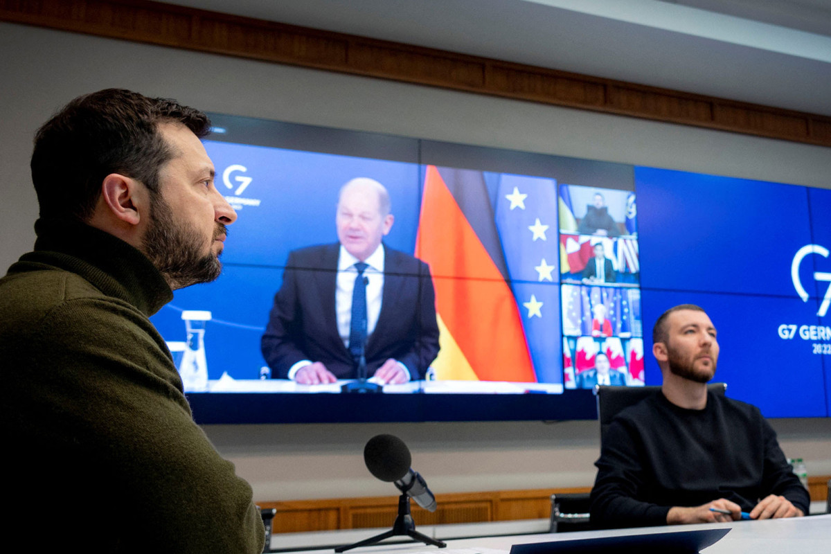 Ukrainian President Volodymyr Zelenskiy attends a meeting of G7 leaders via video link in Kyiv on December 12.